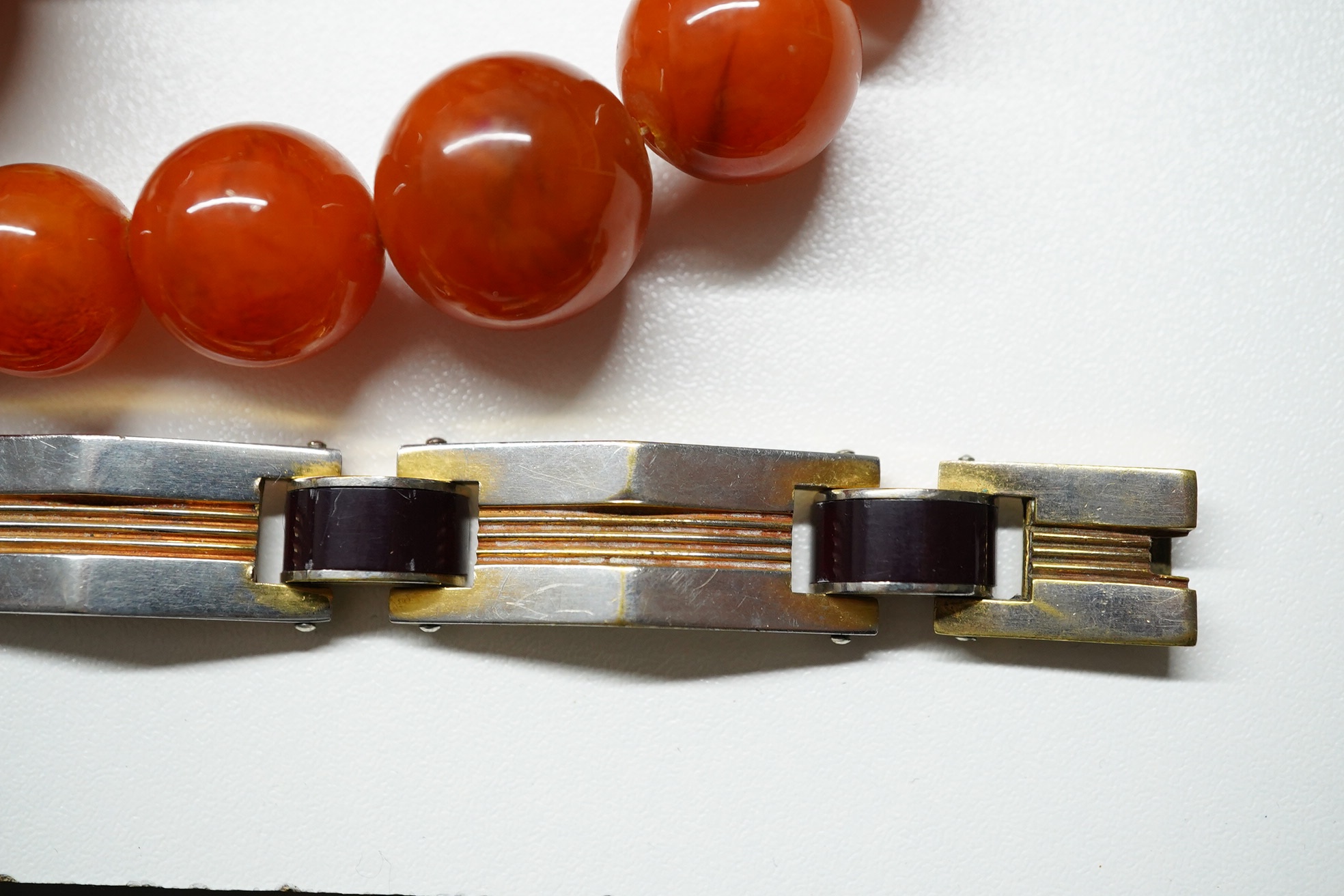 A French 1920's/1930's base metal and bakelite? set bracelet by Jacob Bengal?,18cm, together with an 18ct and gem set ring, a 9ct heart locket and a quantity of assorted costume jewellery. Condition - poor to fair